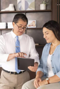 An orthotic clinician consulting with a patient.