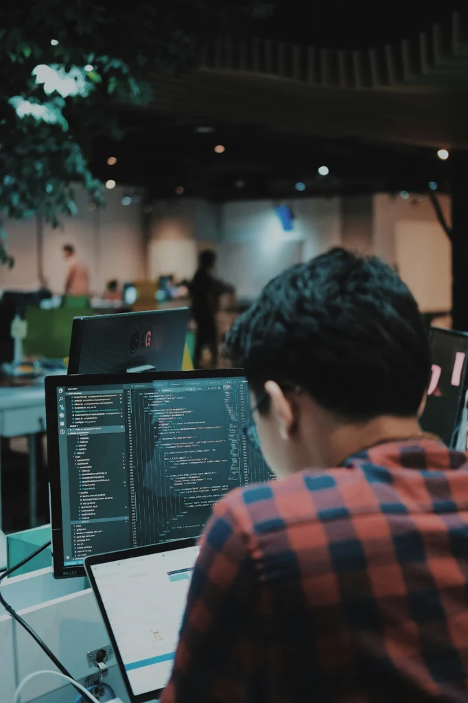 Developer reviewing mobile app code before an App Store submission