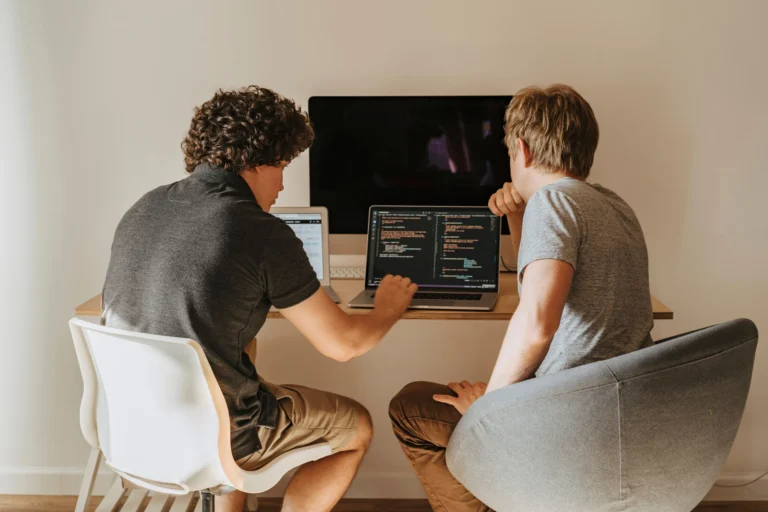 Two people working together on a Vibe Coding Rescue
